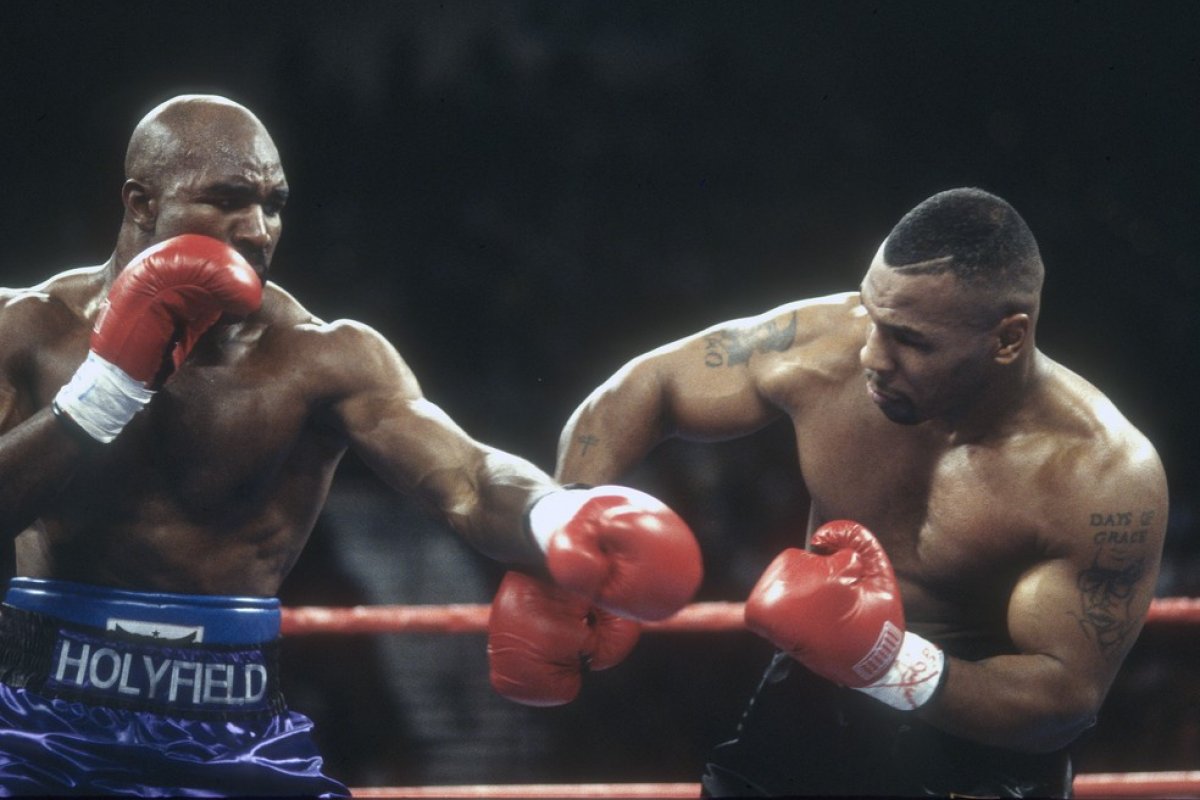 Holyfield convida Tyson para uma terceira disputa e provoca: "Chegou a hora e ele está com medo"