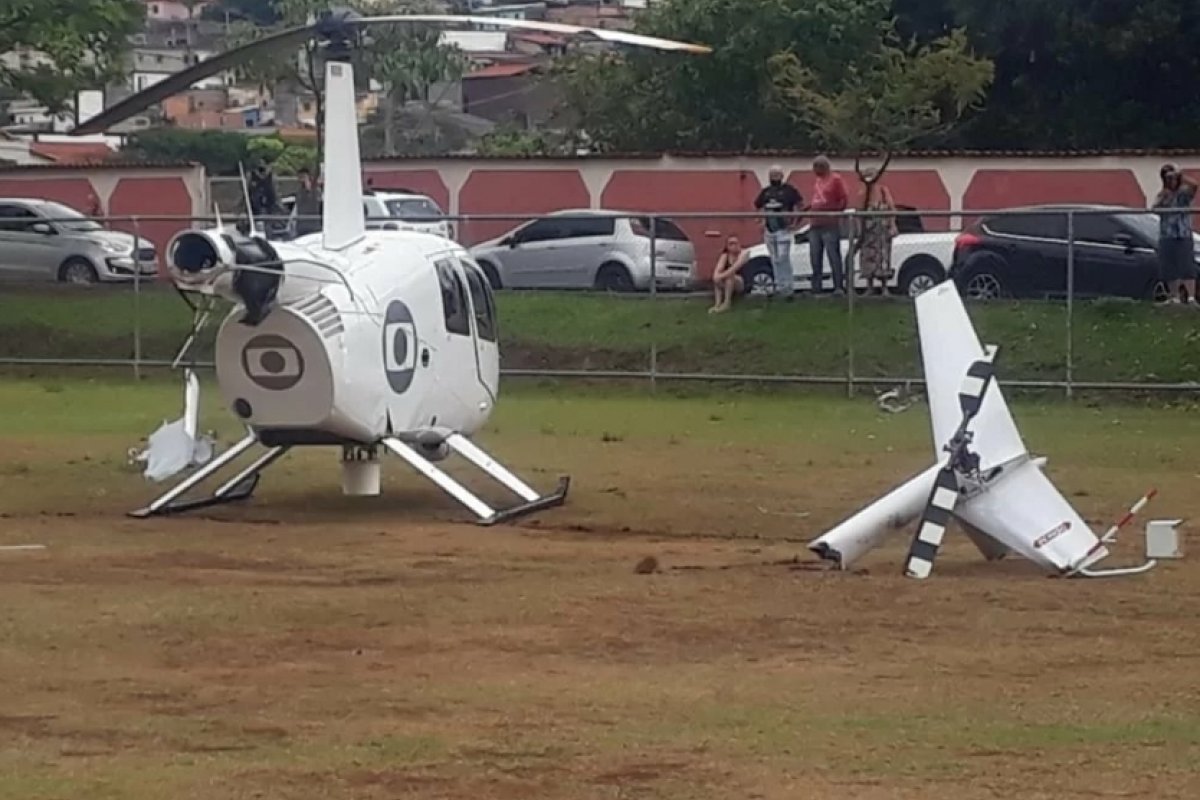 Vídeo: Após acidente, piloto do helicóptero da Globo, se ajoelha e reza em frente a aeronave 