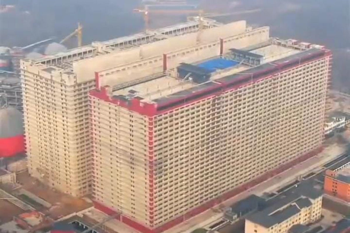 [Vídeo: China constrói prédio de 26 andares para abater um milhão de porcos por ano]