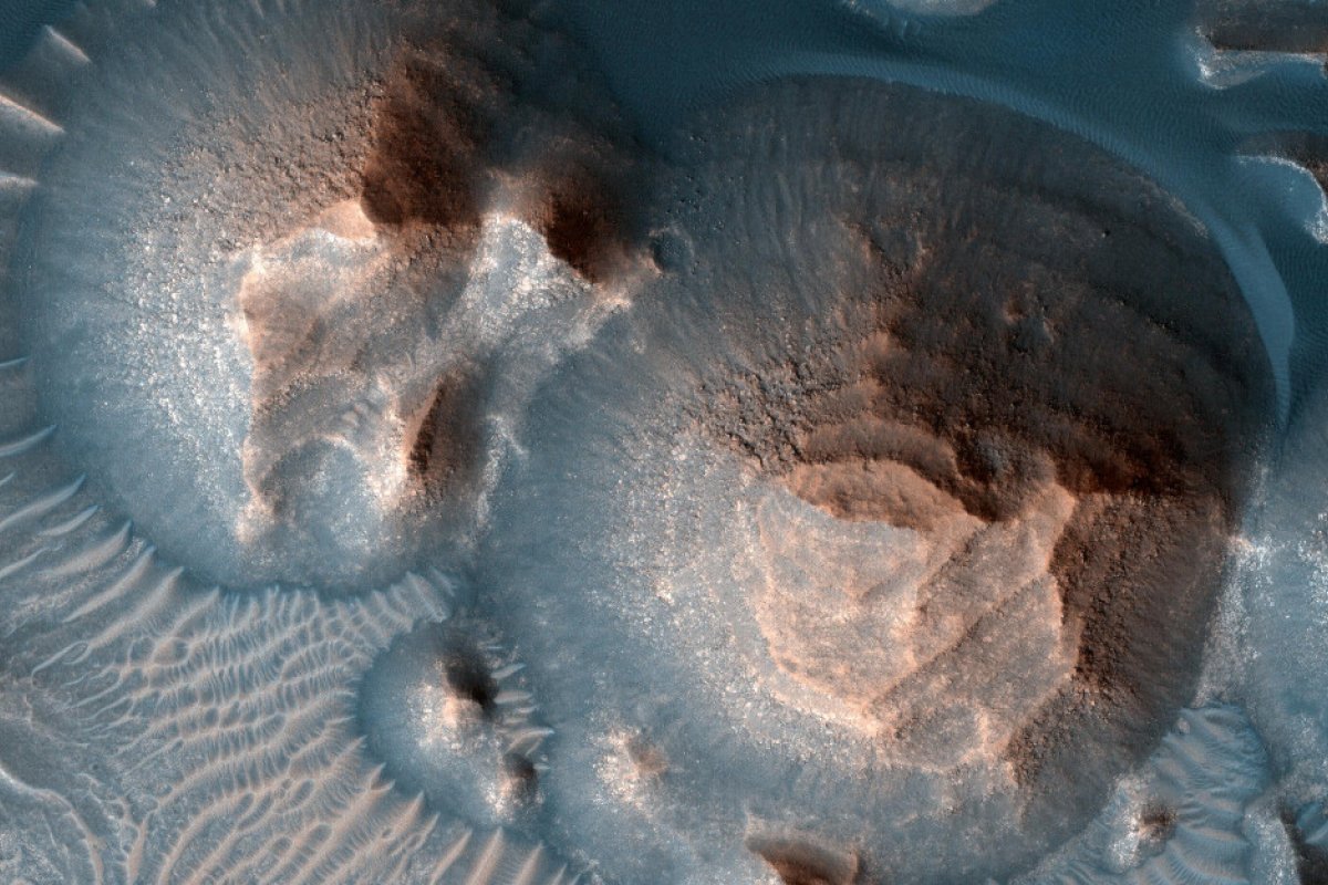 [Estudo da Nasa mostra que super erupções alteraram o clima de Marte ]